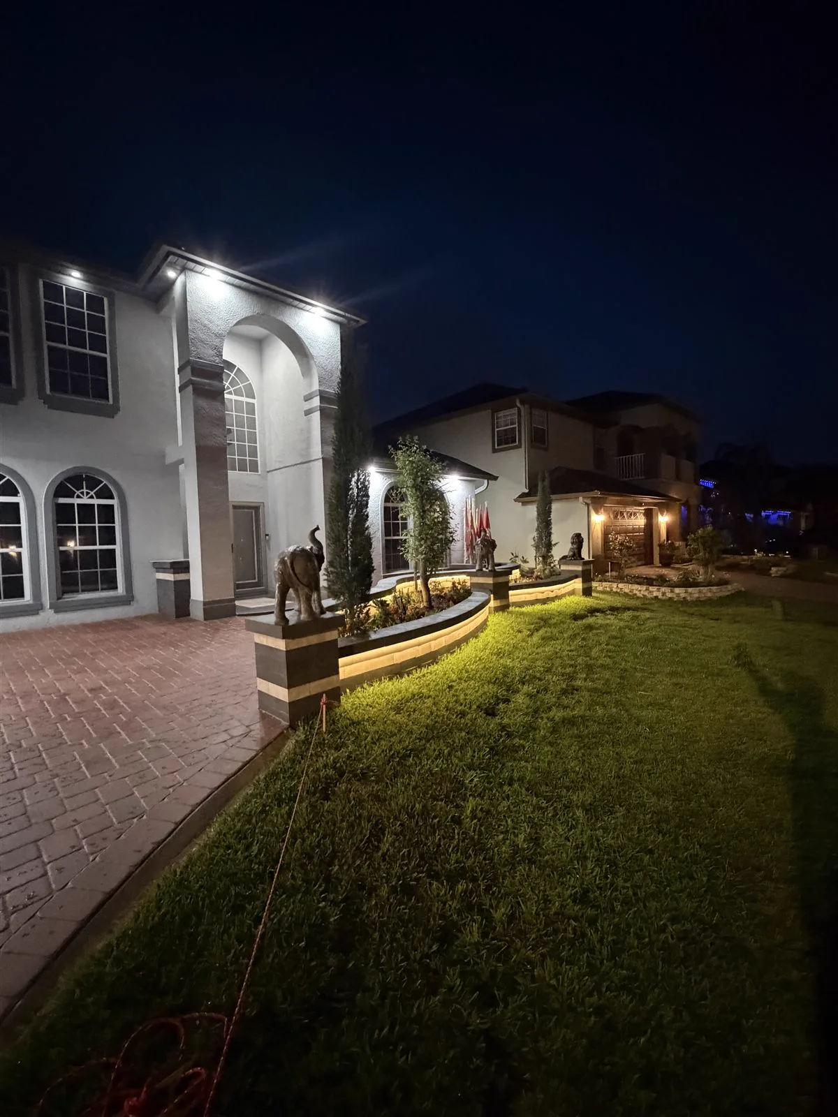 Illuminated outdoor living space at night