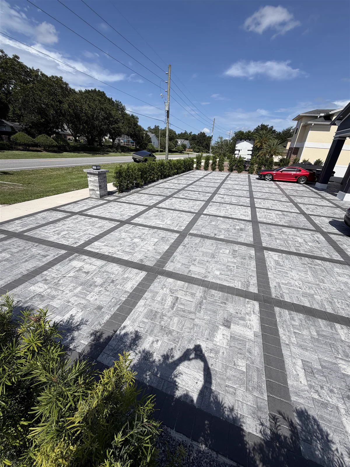 Luxury silver travertine paver driveway by GCM